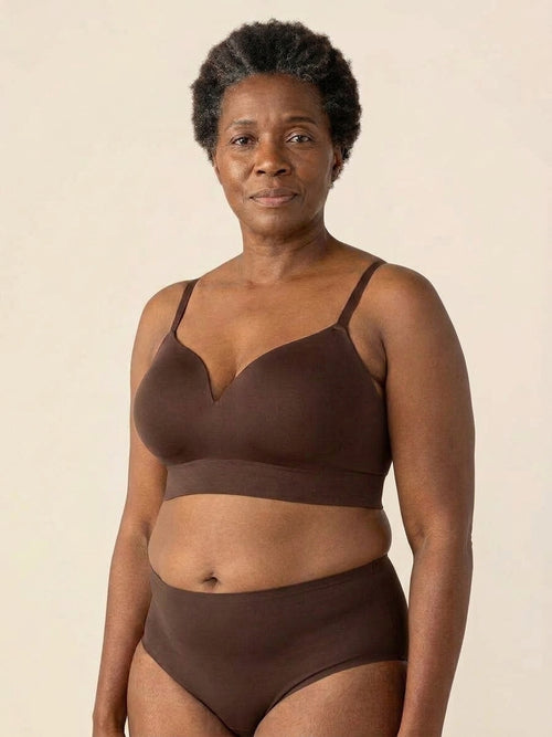 Snug wireless shaping bra in chocolate, front view on a size 44DDD body