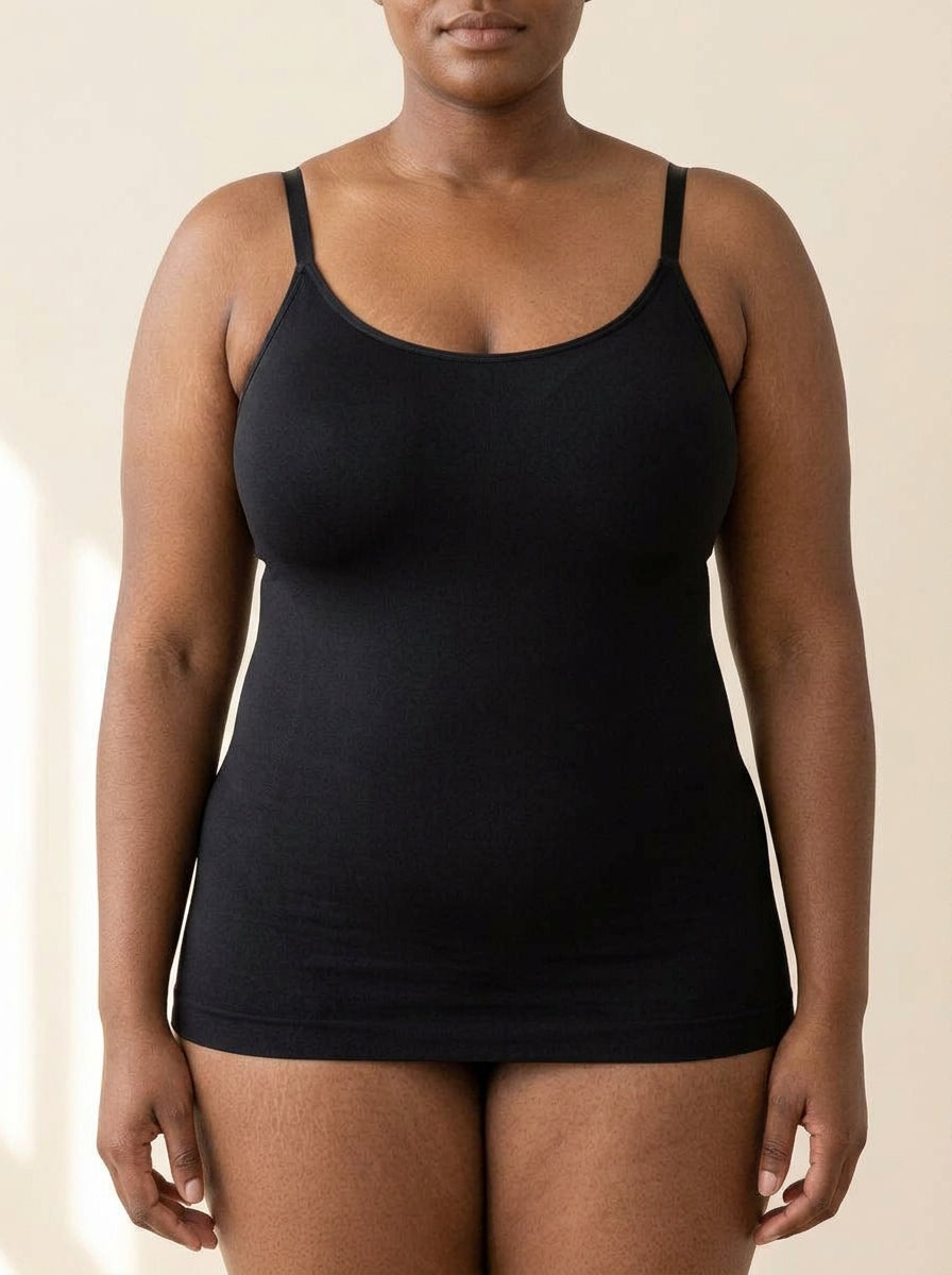 Snug scoop-neck shaping cami in black, worn over a bra