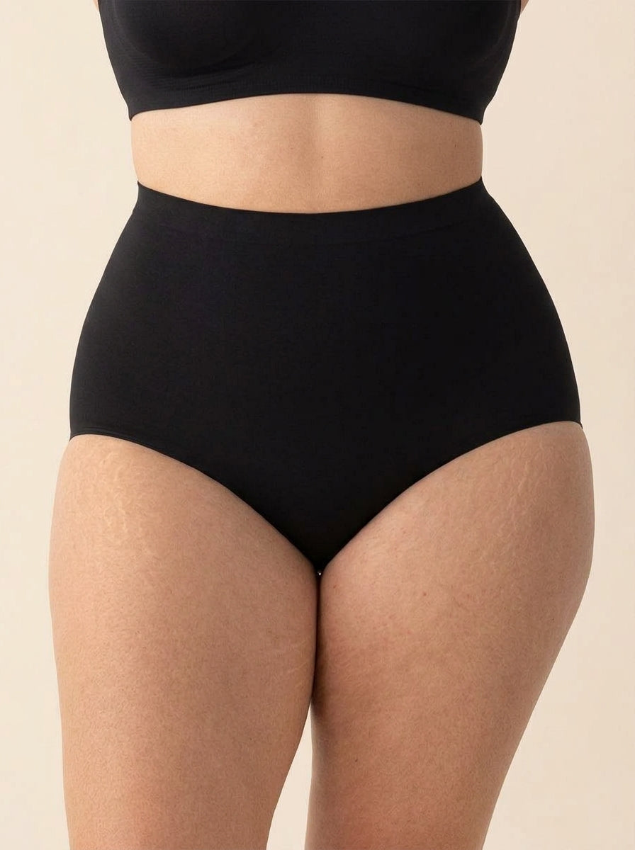 Snug high-waisted shaper panty in black, front view