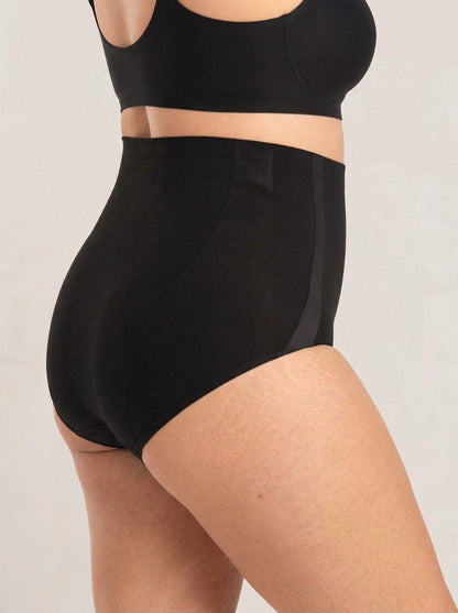 Snug high-waisted shaper panty in black, side view
