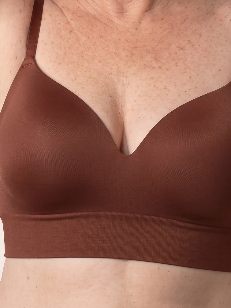 Close-up of the Chocolate bra — molded cups, centre V and seamless band